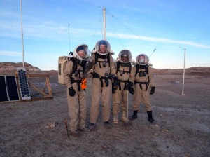 The intrepid EVA4 crew (Kiri, Mike, Luis, and Darrel) after raising the north antenna