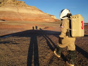 Darrel (#3) and shadows of Kiri and Mike at sunset in front of Olympus Mons